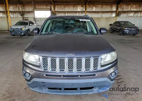 2016 Jeep Compass Latitude z USA, uszkodzony, nr VIN 1C4NJCEB1GD620664